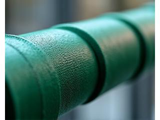 Specialized insulation material designed to withstand harsh chemical environments, showing protective layering.