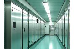 Clean, insulated pipes and machinery in a food processing plant, emphasizing hygiene and temperature control.
