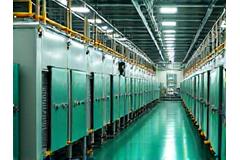 Insulated machinery and pipes on a modern manufacturing production line, clean and efficient.
